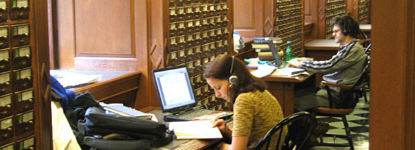 Students find a quiet place to work in the old card catalog room, Butler Library.