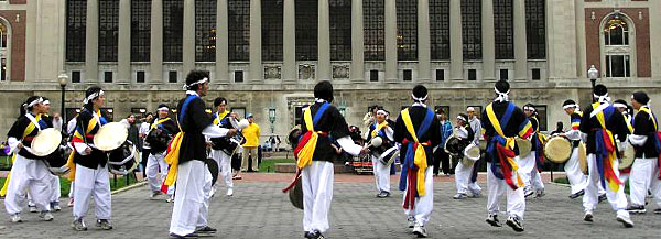 The Korean Drum Troupe performs in front of Butler Library to raise money for cancer relief.