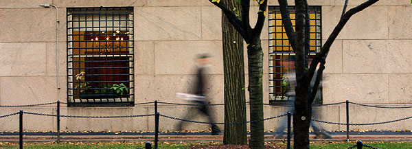 Students pass each other on College walk.