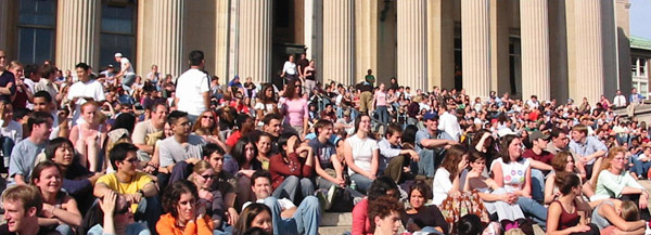 Columbia students listen to a concert on the steps of Low Library.