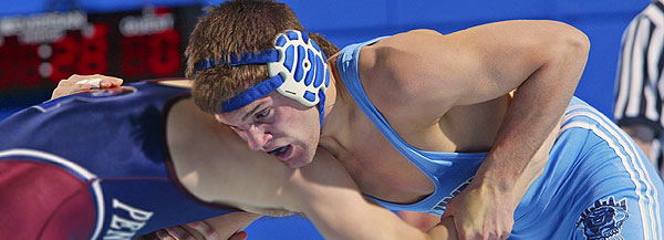 Lions wrestler Ricky Turk, CC '07, in a match against the University of Pennsylvania.