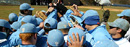 The Columbia Lions baseball team in a huddle before a game.