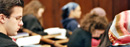 Students take notes in chemistry class.