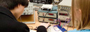 Electrical engineering students work on a project.