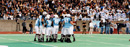 Columbia football players on the field during the 2003 homecoming game.