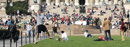 Students enjoy a warm spring day in front of Low Library.