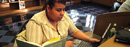 A student at work in Butler Library.