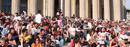 Columbia students listen to a concert on the steps of Low Library.