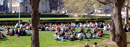 Columbia students and professors take advantage of pleasant weather, holding class outdoors.